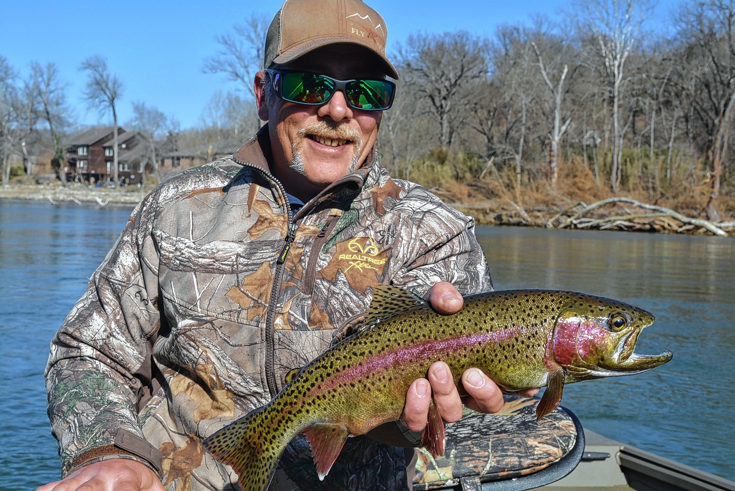 Duane Doty, a guide at Lake Taneycomo, will tell you that the fishing for big rainbows has excelled in the aftermath of a late-December flood at the Ozarks reservoir. (Brent Frazee/Kansas City Star/TNS)
